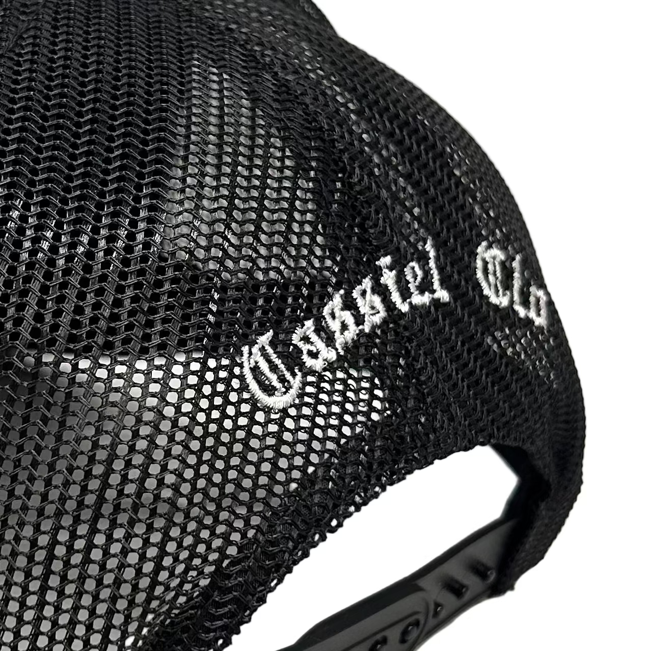 Cassiel Cross Embroidered Black Trucker Cap