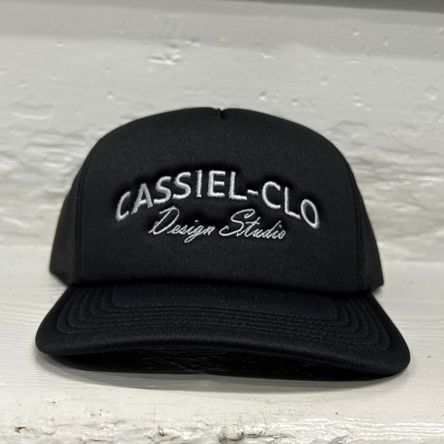 Cassiel Arch Logo Black Foam Trucker Cap