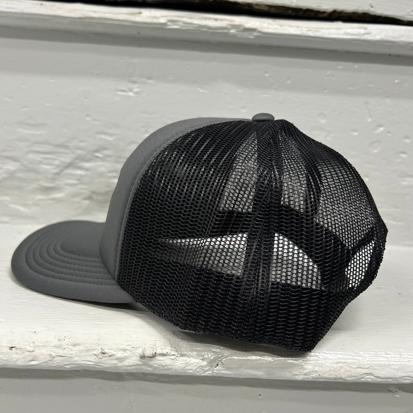 Cassiel Arch Logo Grey Foam Trucker Cap