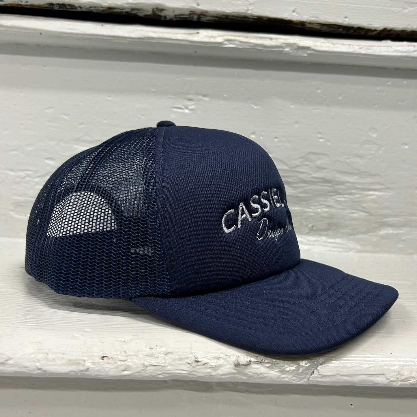 Cassiel Arch Logo Navy Foam Trucker Cap