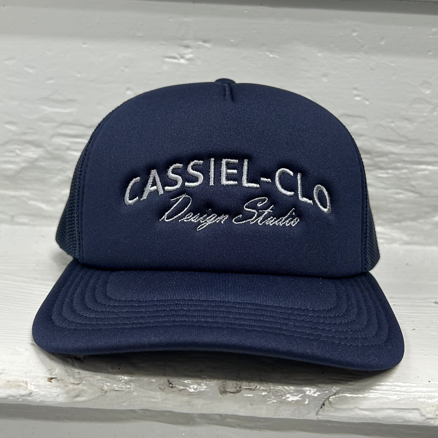 Cassiel Arch Logo Navy Foam Trucker Cap