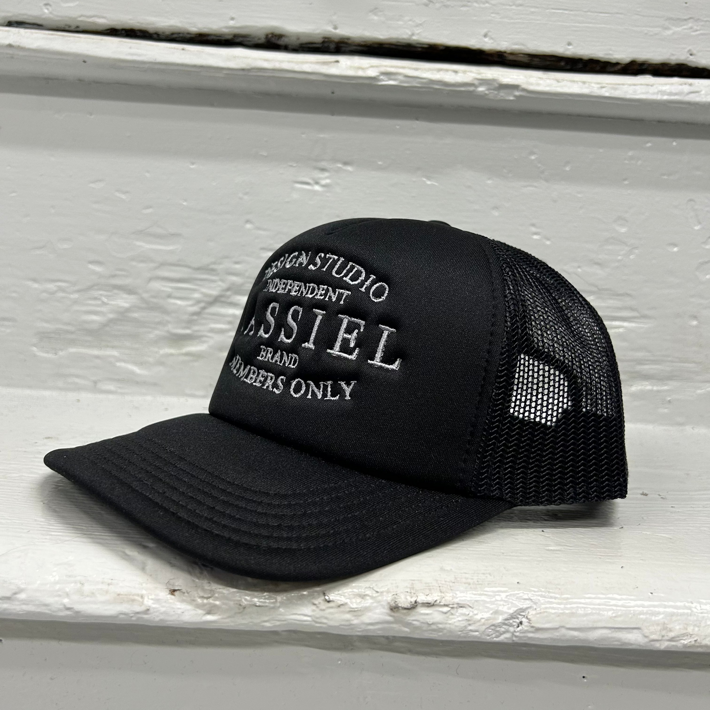 Cassiel Brand Logo Black Foam Trucker Cap