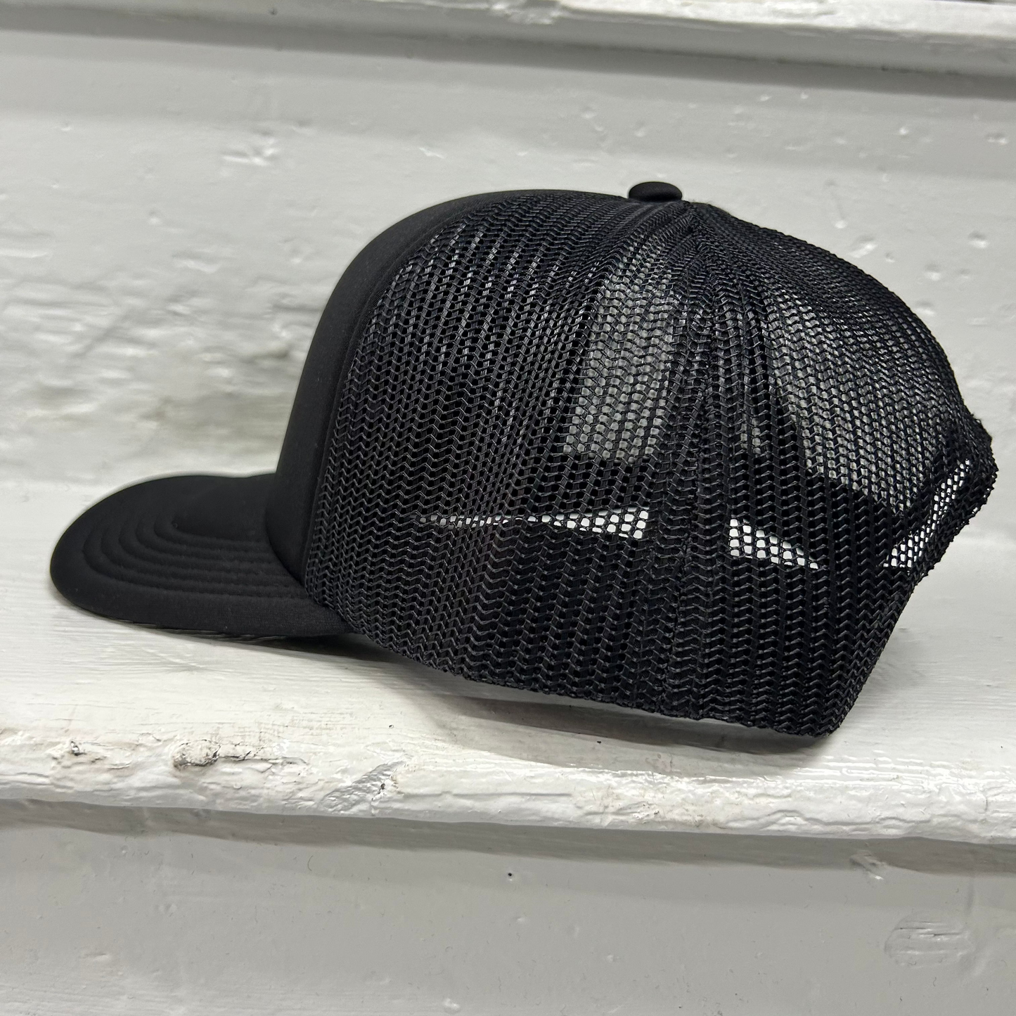 Cassiel Cross Logo Black Foam Trucker Cap