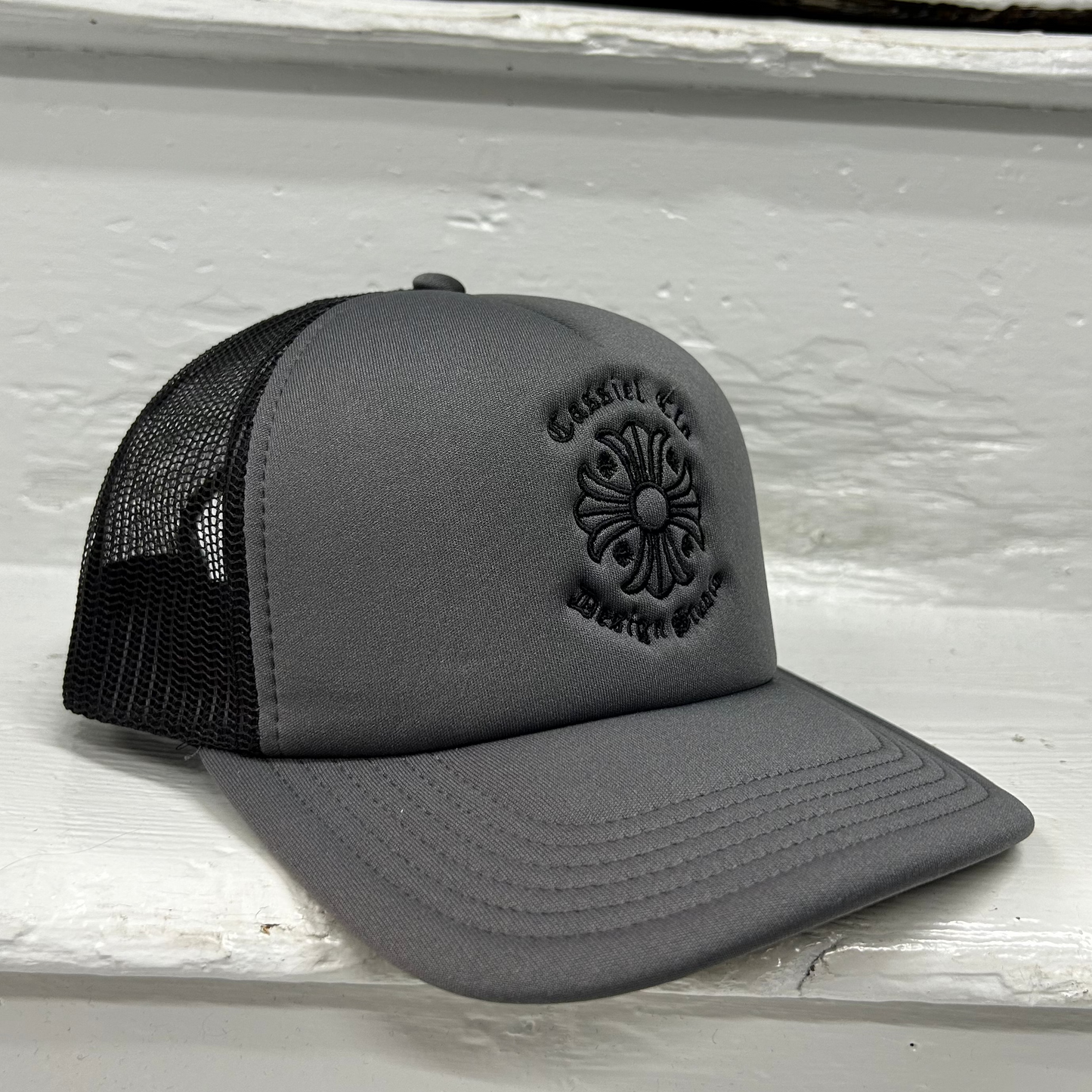 Cassiel Cross Logo Grey Foam Trucker Cap