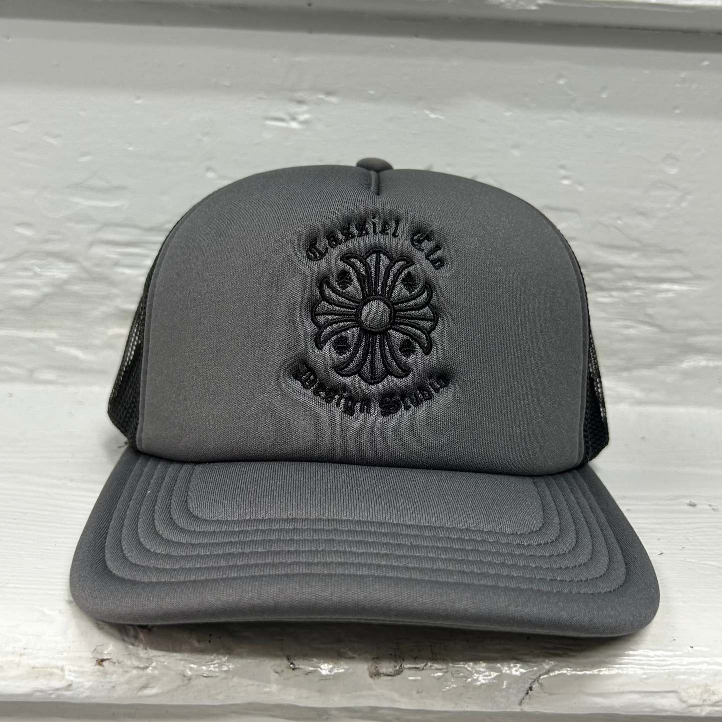 Cassiel Cross Logo Grey Foam Trucker Cap