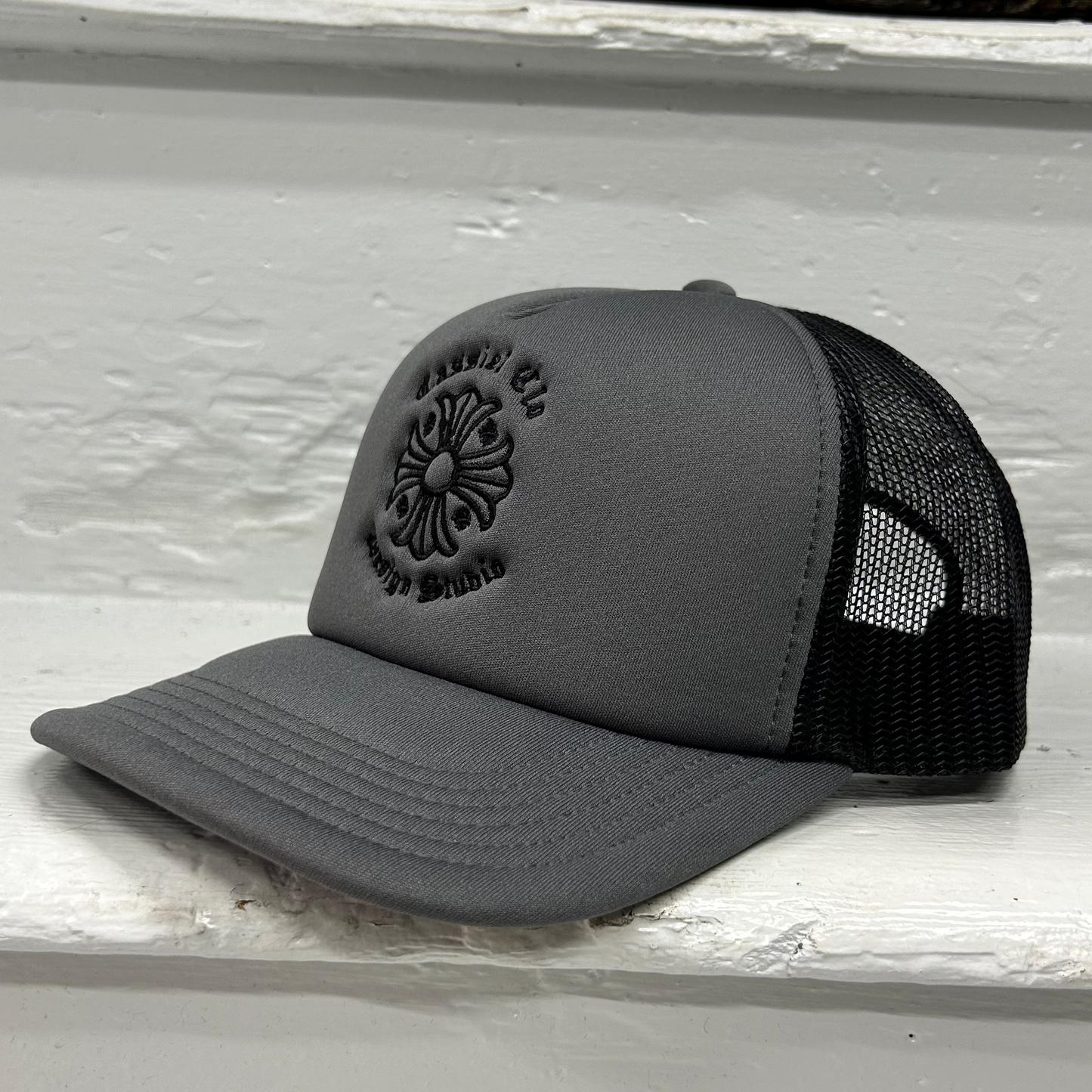 Cassiel Cross Logo Grey Foam Trucker Cap