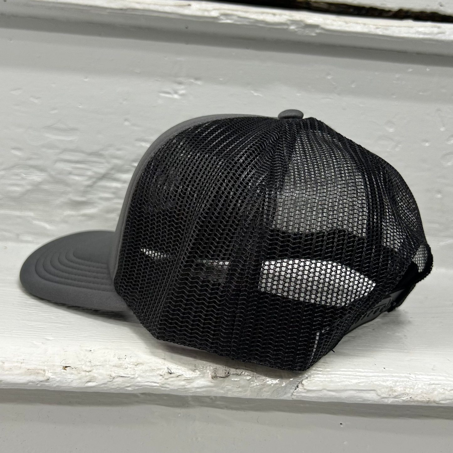 Cassiel Cross Logo Grey Foam Trucker Cap