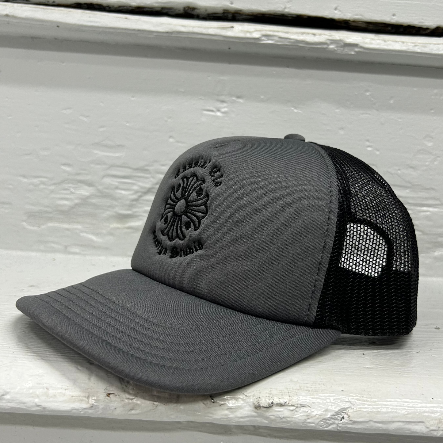 Cassiel Cross Logo Grey Foam Trucker Cap